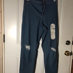 A3 zip and button front denim jeans distressed in both legs size 26W.